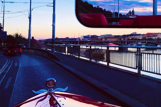 1,5 hour oldtimer convertible Prague sightseeing tour - Dancing House, Charles Bridge, and Old Town Square: the big postcard chain