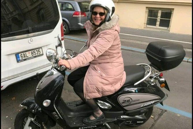Big scooter tour of Prague, for two (audio guide) - Lennon Wall and the Chertovka water mill: art and old-world tech