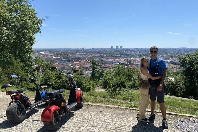 Create your own route on eScooter and enjoy Prague on wheels! - Getting ready at Uhelný trh: helmet, phone holder, and a real test ride