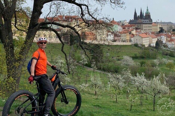 FAT TIRE E-BIKE GREAT TOUR - river, parks & panoramic views tour - Cernin Palace to Lennon Wall: Prague’s official and street-history mix
