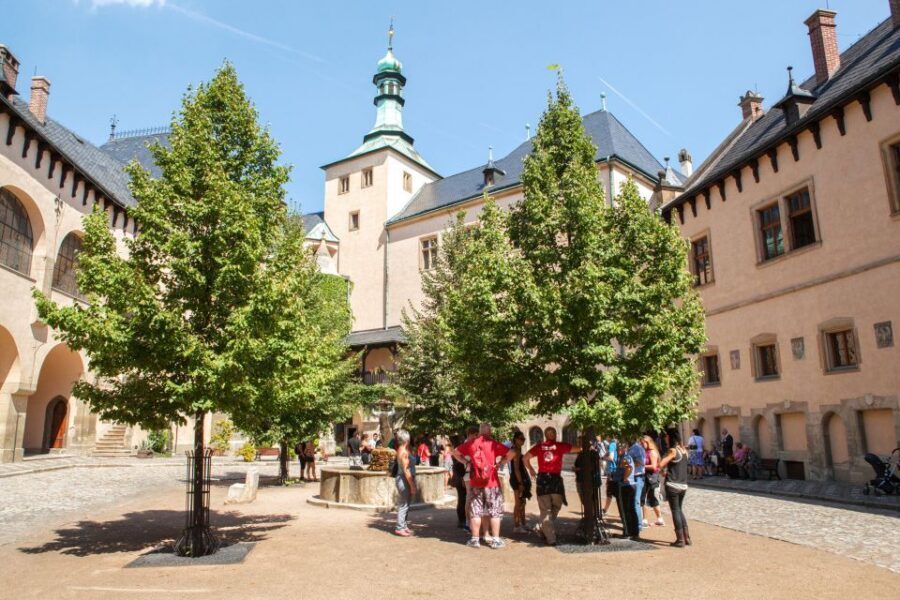 From Prague: Kutna Hora UNESCO Site Tour with Bone Chapel - Italian Court, Ruthardka Street, and the Stone House: walking through royal wealth