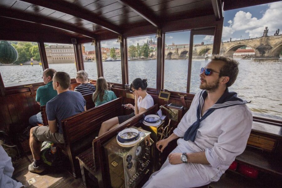 Prague: 3–Hour Castle Grounds Walking Tour and River Cruise - From the Clementinum area to Charles Bridge: a smart first leg