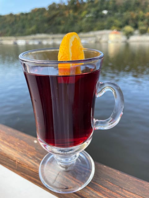 Prague: Advent Boat Cruise with Sweets and Hot Drinks - Christmas carols and winter views from the river