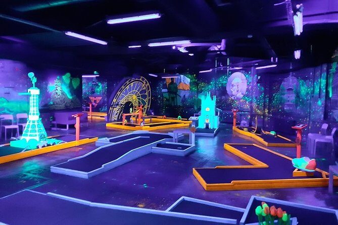 Prague Black Light Mini Golf and Games with free Drinks - What you do on-site: 18 UV holes plus extra games for the full hour