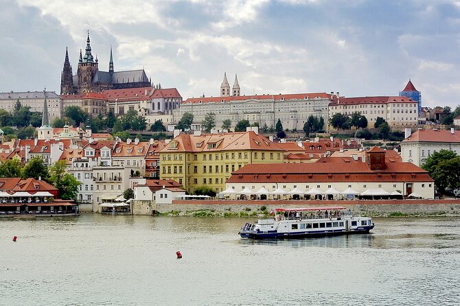 Prague DeLuxe Tour: Views, Hidden Gems, Tastings & River Cruise - Entering Prague Castle grounds: courtyards, St. Vitus, and a Lobkowicz toast