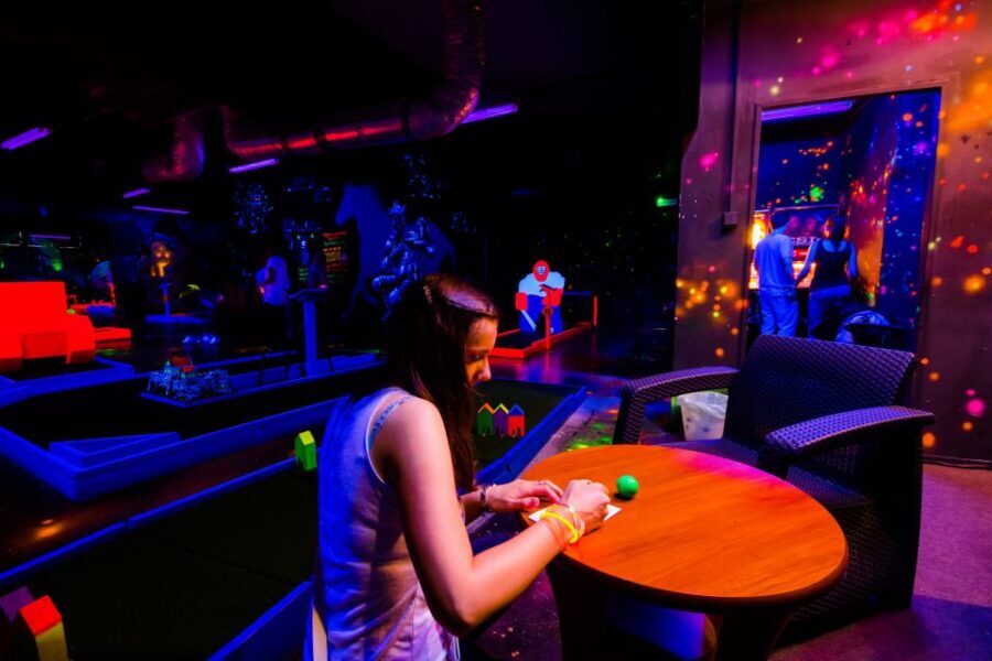 Prague: Glow Golf Mini Golf Game by UV Light - Not Included Drinks and Snacks: How to Budget for the Full Night