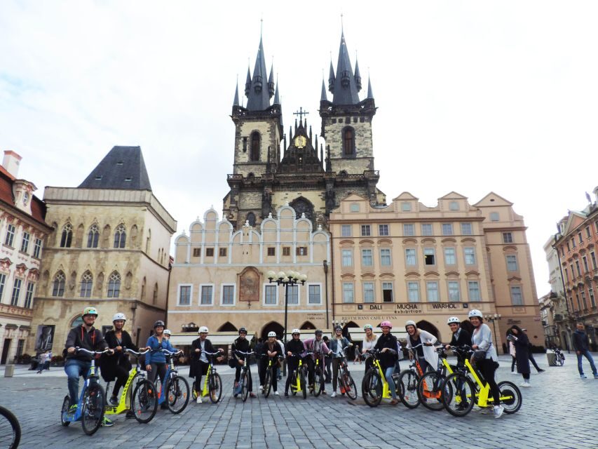 Prague: Highlights Tour on e-Scooter or eBike - Charles Bridge, the narrowest street, and the Franz Kafka Museum art detour