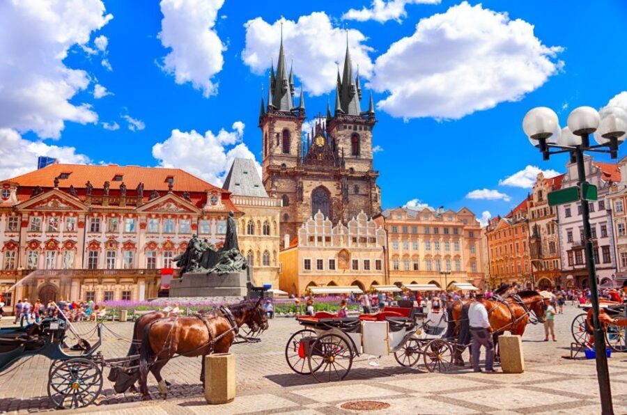 Prague Old Town Family Tour, Attractions, Royal Castle - Crossing Charles Bridge with saints, legends, and river views