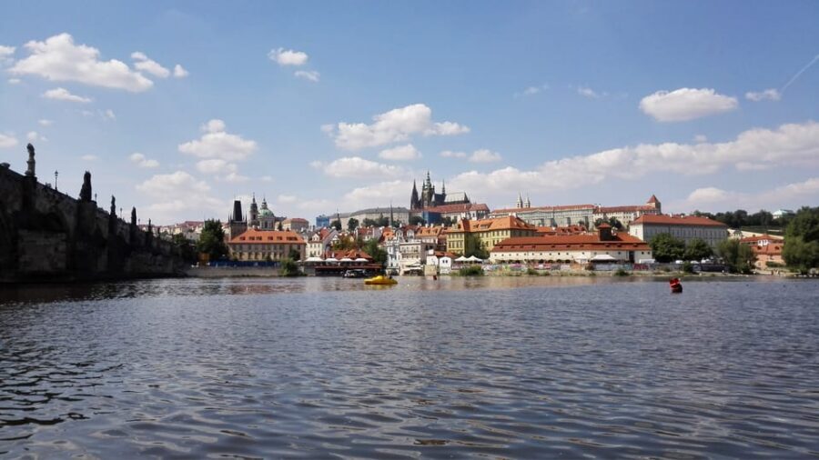Prague: Old Town Guided Walking Tour and City Boat Ride - The 1-hour Vltava boat ride: headset stories and Prague Castle views