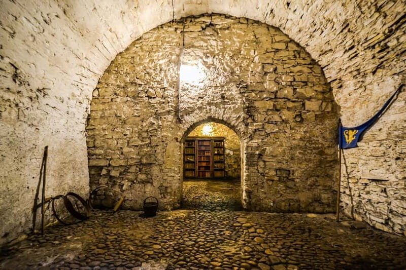 Prague: Oldtown, Medieval Underground & Dungeon History Tour - Descending two floors: medieval cellars, corridors, and daily life