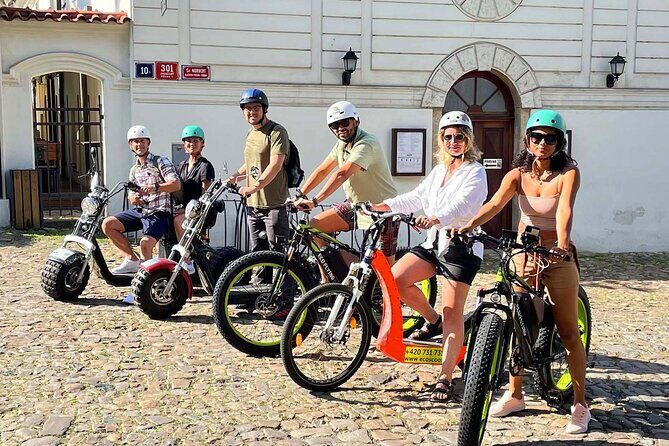 Prague Panoramic Views e-bike and e-Scooter guided Tour - Stops 7 to 8: Petrin Hill views, then the John Lennon Wall
