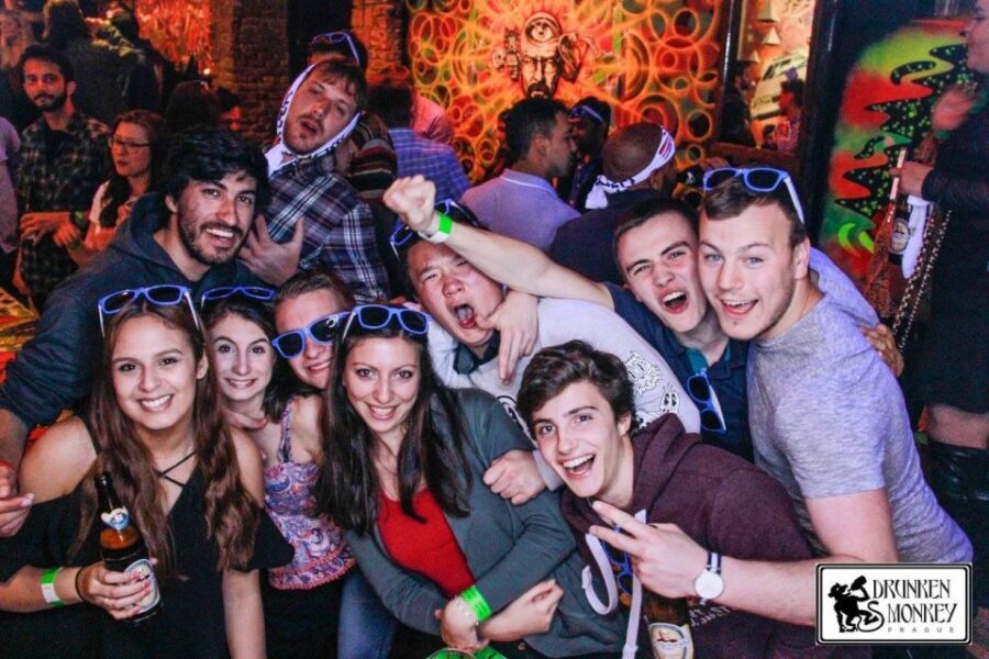 Prague: Pub Crawl with Open Bar and VIP Entry - Stop 1: Drunken Monkey’s Games, TVs, and Early Party Fuel