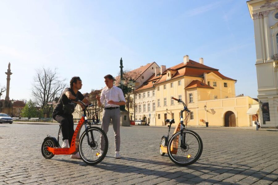 Prague: Tour by Electric Scooter or Cruiser eBike - Where the tour starts on foot to keep the ride calm