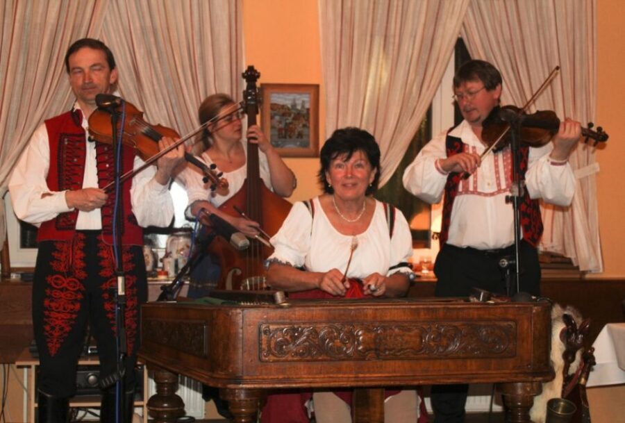 Prague: Traditional Folklore Evening with Dinner & Music - Getting there: hotel pickup and a quick ride through historic Prague