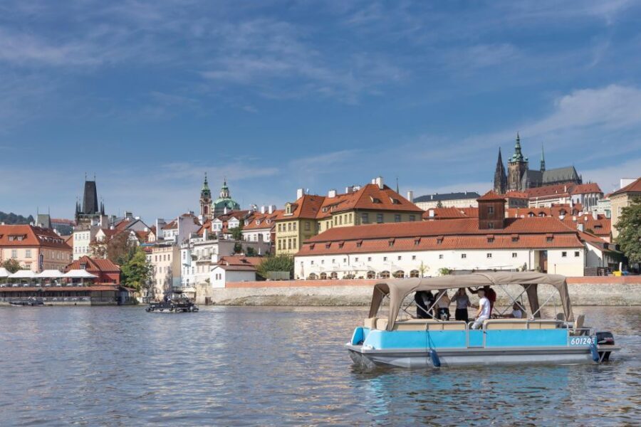 Private Boat Cruise With Unlimited Prosecco - The Prague Castle Complex Looming Over the Water