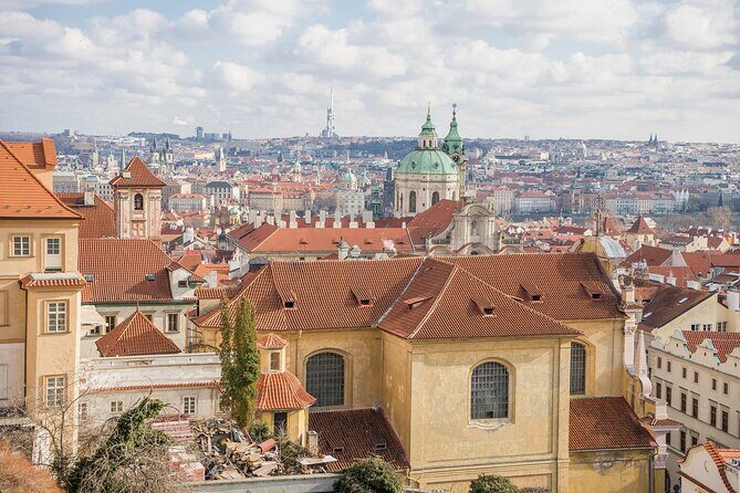 Private Prague City Highlights Tour with a Stop at a Czech Cafe - Charles Bridge views and the peace-themed street art pause