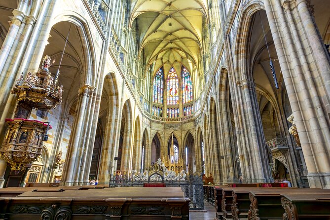 Private Tour of Prague Castle Interiors and Lunch included - St. Vitus Cathedral: stained glass, crowns, and the big dramatic moments
