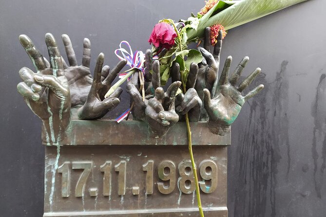 Wars and Totality History tour in Prague - Narodni Trída Hands-on-Wall Memorial and the Velvet Revolution Trigger Spot